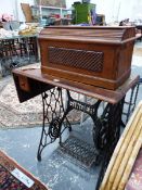 A SINGER TREADLE SEWING MACHINE.