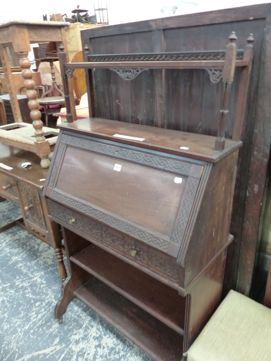 AN EDWARDIAN MAHOGANY BUREAU IN THE CHIPPENDALE MANNER. W 77 X D 39 X H 139CMS.