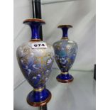 A PAIR OF DOULTON AND SLATER BALUSTER VASES