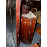 A GEORGE III OAK BOWFRONT CORNER CABINET, A MAHOGANY TEA CADDY AND A LARGE MIRROR (3)
