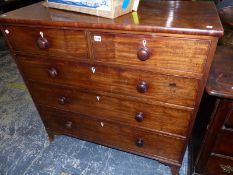 AN ANTIQUE CHEST OF DRAWERS THREE LONG AND TWO SHORT.