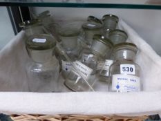A COLLECTION OF ELEVEN LABELLED PHARMACY JARS TOGETHER WITH A PIPETTE