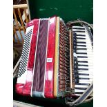 A VINTAGE PIANO ACCORDIAN AND CASE.