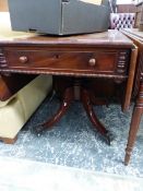 AN EARLY VICTORIAN MAHOGANY PEDESTAL PEMBROKE TABLE ON QUADRUPED SABRE LEGS. W 120 X D 104 X H