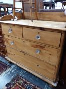 A VICTORIAN PINE CHEST OF DRAWERS WITH GALLERY TOP AND GLASS KNOB HANDLES. W 97 X D 55 X H 94CMS.