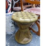 A BUTTON LEATHER UPHOLSTERED DRESSING STOOL.