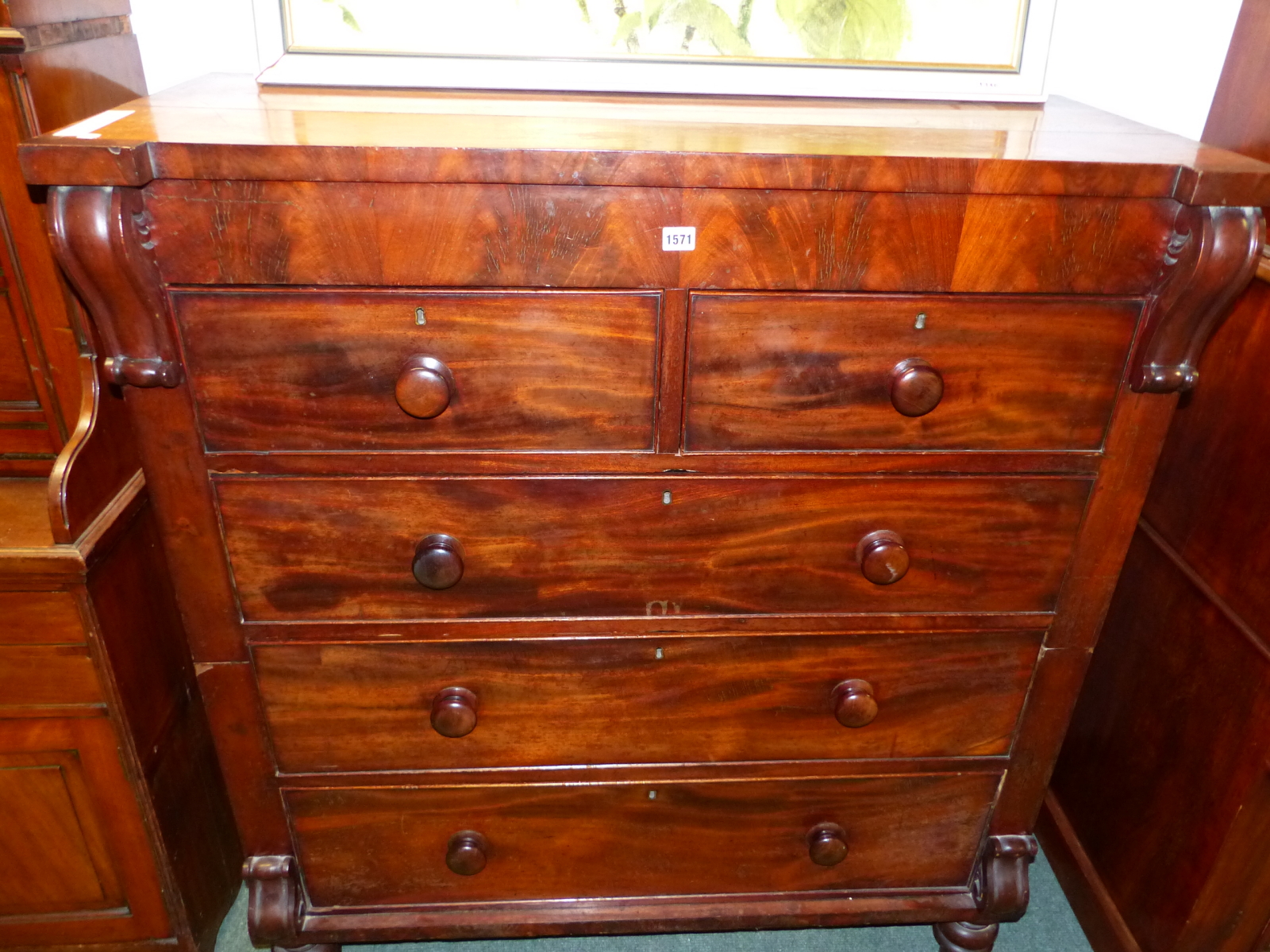 A VICTORIAN MAHOGANY CHEST OF TWO SHORT AND THREE GRADED LONG DRAWERS ON SPINDLE FEET. W 116 x D