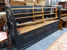 AN ANTIQUE RUSTIC BOX SEAT PINE SETTLE. W 177 X D 52 X H 97CMS.