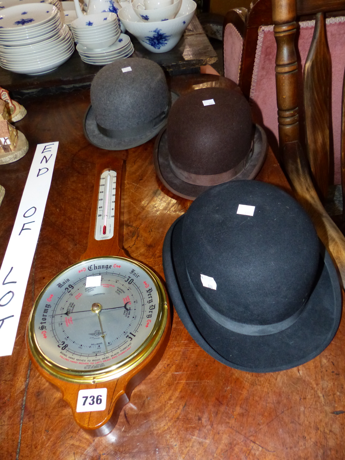 THREE BOWLER HATS AND AN ANEROID BAROMETER