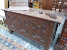 A SMALL ANTIQUE STYLE OAK THREE PANEL COFFER. W 91 X D 45 X H49CMS.