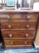 AN ANTIQUE MAHOGANY SMALL FOUR DRAWER CHEST WITH KNOB HANDLES. W 67 x D 44 x H82cms.