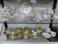 A MASON HOLT AND CO PINK ROSE PAINTED TEA SET TOGETHER WITH GREEN GROUND TEA CUPS AND SAUCERS