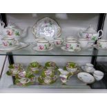 A MASON HOLT AND CO PINK ROSE PAINTED TEA SET TOGETHER WITH GREEN GROUND TEA CUPS AND SAUCERS