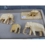 A GROUP OF ANTIQUE CARVED IVORY ELEPHANTS.