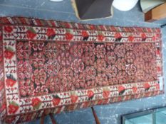 AN ANTIQUE PERSIAN TRIBAL RUG, 175 x 82cm TOGETHER WITH A BELOUCH PRAYER RUG (2)