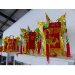 FOUR CHINESE DRSAGON DECORATED RED TEXTILE LANTERNS