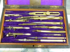 AN ANTIQUE CASED GEOMETRY SET.