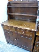 A SMALL OAK DRESSER. W 97 X D 48 X H 151CMS.