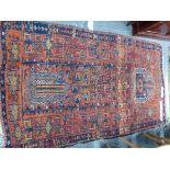 AN ANTIQUE PERSIAN TRIBAL RUG, 226 x 130cm