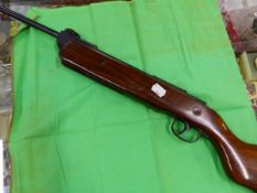 A SERIES 70 MODEL 76 AIR RIFLE.