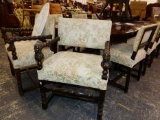 A SET OF EIGHT CARVED OAK CAROLEAN STYLE OAK DINING CHAIRS.