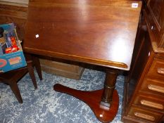 A VICTORIAN MAHOGANY ADJUSTABLE READING STAND.