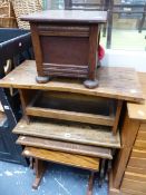 A NEST OF OAK TABLES, AN OAK BOX STOOL AND ONE OTHER.