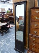 A TALL ANTIQUE STAINED PINE FRAMED PIER MIRROR.