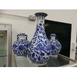 THREE BLUE AND WHITE ORIENTAL VASES, WITH CHARACTER MARKS TO BASES.