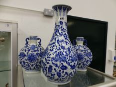 THREE BLUE AND WHITE ORIENTAL VASES, WITH CHARACTER MARKS TO BASES.