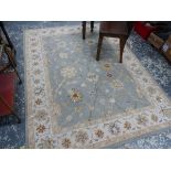 A MACHINE MADE OCTAGONAL RUG OF PERSIAN DESIGN, 201 x 201cm TOGETHER WITH A HOOKED RUG, 223 x