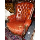 A VICTORIAN STYLE BUTTON BACK ARMCHAIR