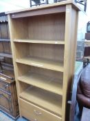 A MODERN OAK FINISHED BOOK CASE. W 86 X D 40 X H 181CMS.