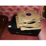 A PORTABLE GRAMOPHONE AND VARIOUS RECORDS.