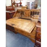 A GEORGIAN STYLE OAK FALL FRONT BUREAU WITH FITTED INTERIOR. W 92 X D 49 X H 101CMS.