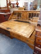 A GEORGIAN STYLE OAK FALL FRONT BUREAU WITH FITTED INTERIOR. W 92 X D 49 X H 101CMS.