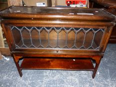 A GLOBE WERNICKE SINGLE BOOK CASE TIER WITH LEADED GLASS ON LATER STAND.