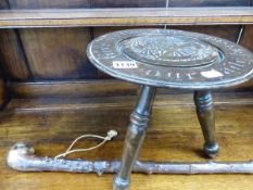 A SMALL CARVED STOOL AND A ROOT WOOD WALKING STICK.