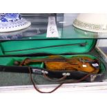 A CASED VIOLIN AND BOW