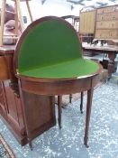 AN EDWARDIAN MAHOGANY AND INLAID FOLD OVER CARD TABLE. DIAMETER 84 X H 75CMS