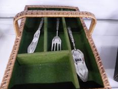 THREE SERVING UTENSILS WITH 800 MARKED SILVER HANDLES TOGETHER WITH A BASKET WORK CUTLERY TRAY