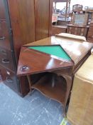 A EDWARDIAN MAHOGANY ENVELOPE CARD TABLE RETAILED BY T G WOOF LTD. W 60 X D 60 H 74 (CLOSED).