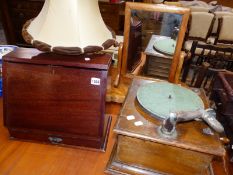 A VINTAGE GRAMOPHONE A MAHOGANY STATIONARY BOX A SWING MIRROR AND A TABLE LAMP.