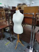 A PAIR OF CHROME CLOTHES RAILS AND A DRESS MAKERS DUMMY.