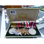 FIVE WWII MILITARY MEDALS AND AN RAF BADGE.