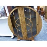 AN ART DECO CIRCULAR DISPLAY CABINET