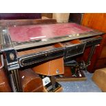 A VICTORIAN EBONISED AND BRASS INLAID WRITING TABLE. W 116 X D 63 X H 74CMS.