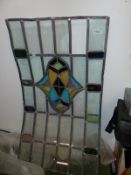 A LEADED GLASS PANEL.