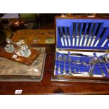 TWO CUTLERY CASES WITH VARIOUS PLATED CUTLERY, A VINTAGE DESK STAND HOLDING TWO CUT GLASS INK