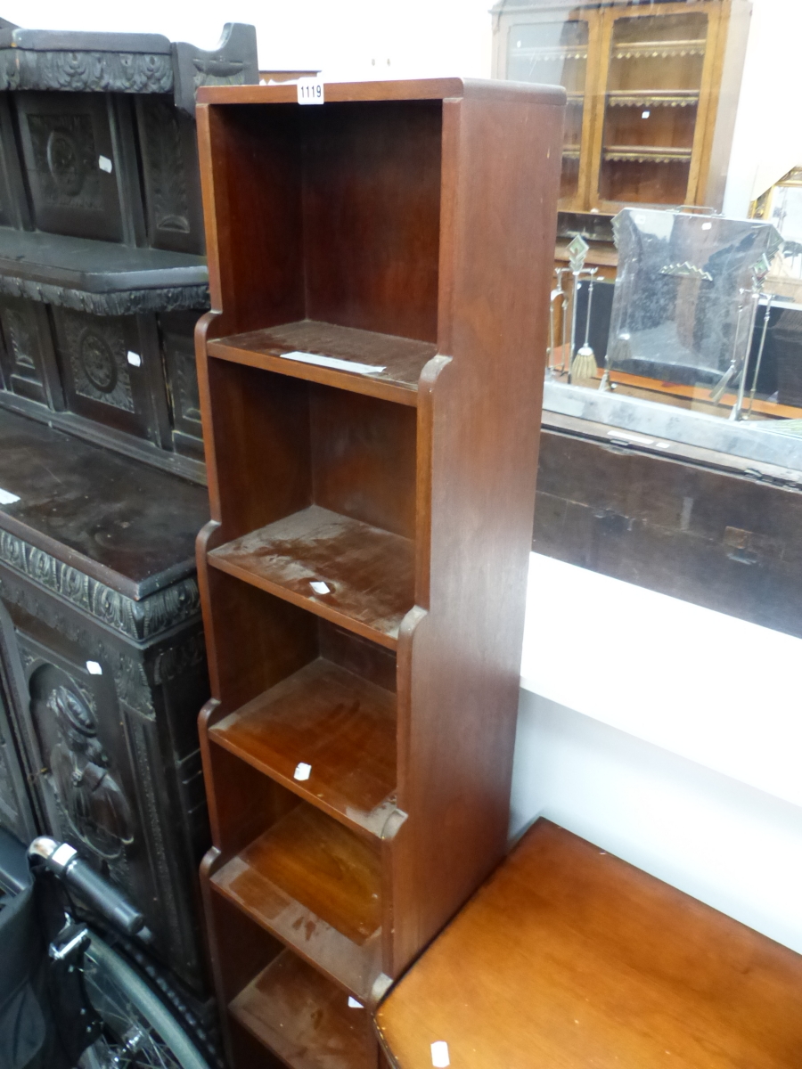 A TALL SLIM MAHOGANY BOOKCASE.